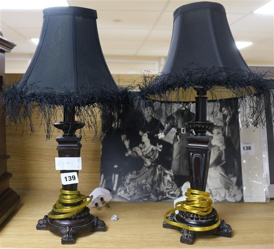 A pair of small table lamps with black shades height 44cm